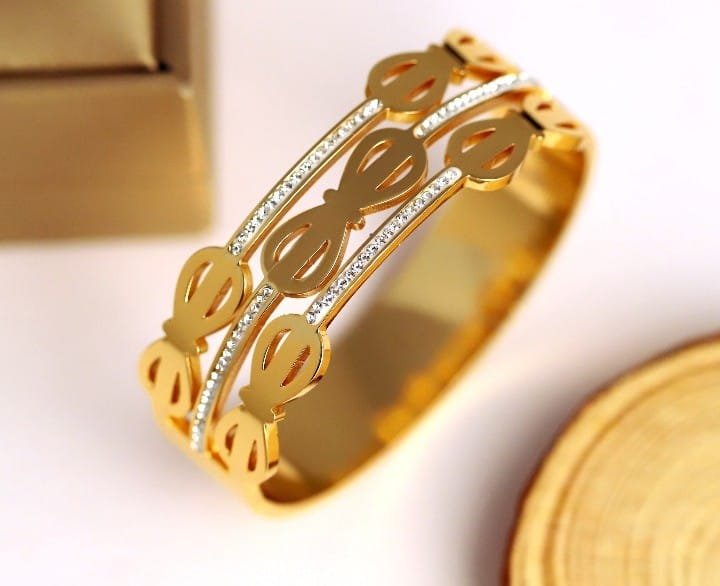 Gold-Tone Triple-Row Bow Link Cuff Bangle